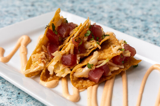 A Plate of Asian Ahi Tacos in Fried Wonton Wrappers