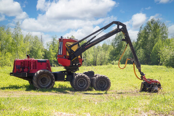 Logging equipment.Harvester and forwarder at the logging site.