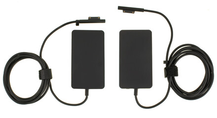 laptop power adapter, laptop spare part, on white background, top view
