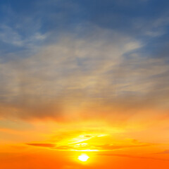 sunset over dramatic cloudy sky, natural evening sky background