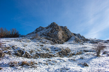 snow-capped mountain with blue sky on sunny day
