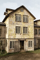 Fototapeta na wymiar Abandoned old wooden house