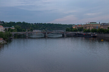 Charles Bridge that crosses the Vltava river in Prague, Czech Republic.