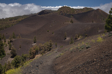 Fototapeta na wymiar La Palma, landscapes along the long-range popular hiking route Ruta de Los Volcanes, going along the crest of the island from El Paso to Fuencaliente municipalities 