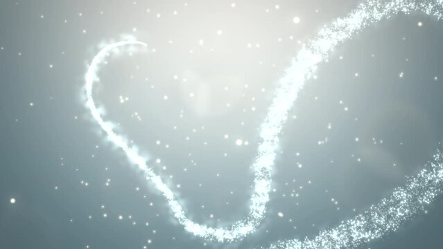 White heart with white glitters on blue sky, motion holidays, romantic and wedding style background