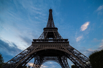 Obraz na płótnie Canvas Paris Eiffel Tower. Eiffel Tower at sunset in Paris, France. Romantic travel background. Paris Eiffel tower France travel landmark. 
