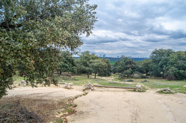 Fototapeta na wymiar View of the city of Madrid, from El Pardo forest