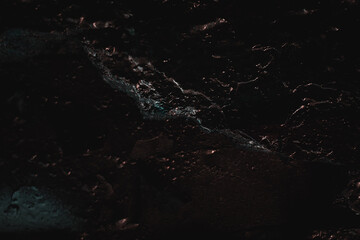 Black texture. Dark marble. Silver Wall. Rock background. Rock texture. Stone background. Rock pile. Paint spots. Rock surface with cracks. Grunge Rough structure. Abstract texture.