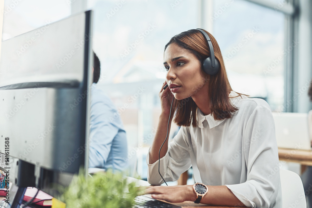 Aufkleber i am ready to answer all your questions. shot of a focussed young businesswoman wearing a headset wh