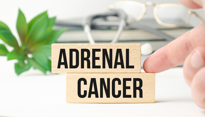 adrenal cancer written on a wooden block and stethoscope