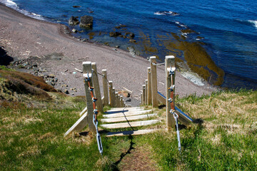 wooden steps leading to ocean, gros morne newfoundland