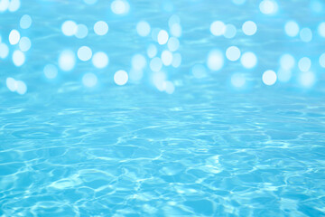 Swimming pool with clear turquoise water. Bokeh effect