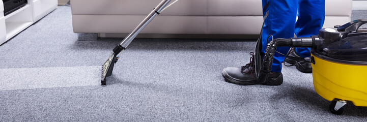 Janitor Cleaning Carpet