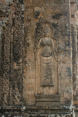 Sandstone sculpture of Apsara at Pre Rup Castle, an ancient castle in Siem Reap, Cambodia.