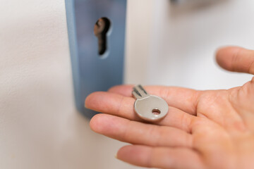 Woman Holding Broken Key