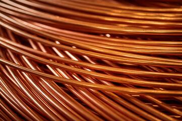Shiny winded copper cable in warehouse of production plant