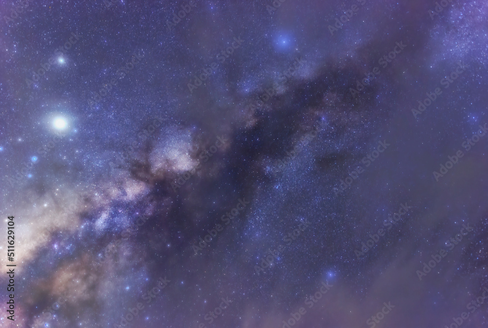 Wall mural milky way galaxy with stars and space dust in the universe, long speed exposure, night landscape wit