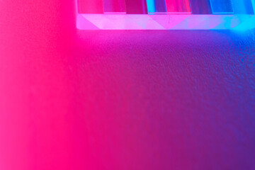 Blurred neon background with geometric shapes, copy space.