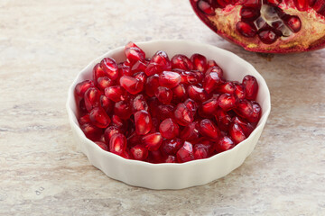 Ripe red Pomegranate seeds in the bowl