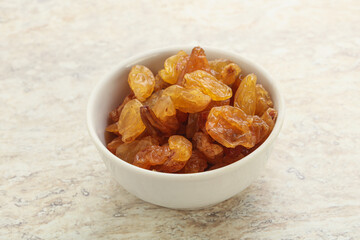 Sweet yellow raisin in the bowl