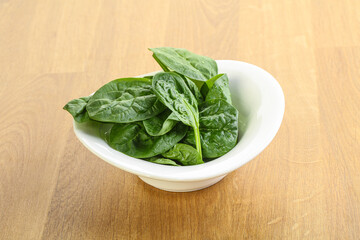 Fresh green spinach leaves in the bowl