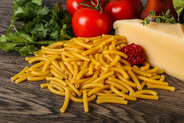 Italian pasta raw Maccheroni for cooking