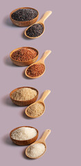 Jasmine rice, jasmine brown rice, jasmine red rice, purple-brown rice in wooden bowl and wooden ladle on pastel color background with clipping path.