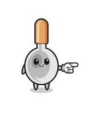 cooking spoon mascot with pointing right gesture