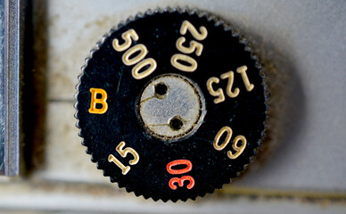 Closeup of old retro film camera ,details of speed dial
