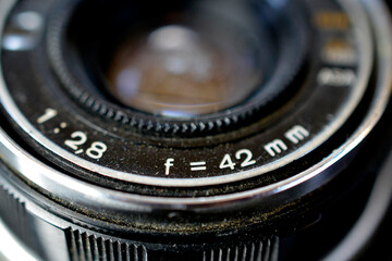 Fototapeta na wymiar Closeup of old retro film camera ,detail of lens