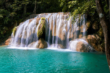 Fototapeta na wymiar Waterfall national park in Thailand with clean river. 