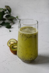 A glass of kiwi smoothie.