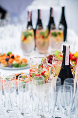 champagne and lemonade on the catering table