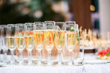 champagne and lemonade on the catering table