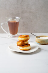 Cheese pancakes breakfast with tea