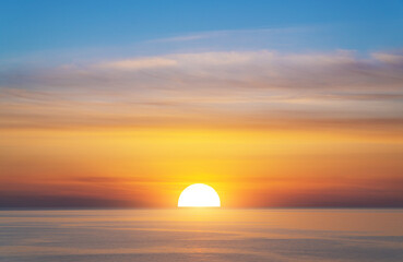 Big sun and sea sunset background