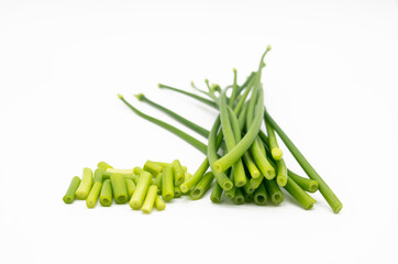 fresh chives close up over on white background