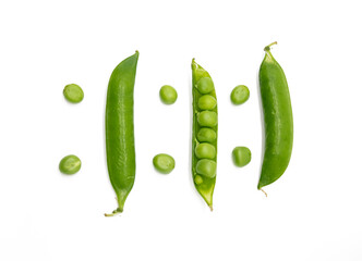 Fresh green peas on a white background, top view