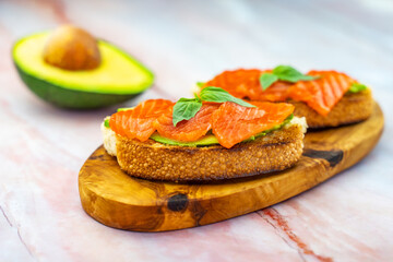 Toast with salmon and avocado.
