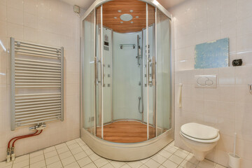 Interior of contemporary bathroom with shower, bathtub, toilet and sink in minimal style in flat