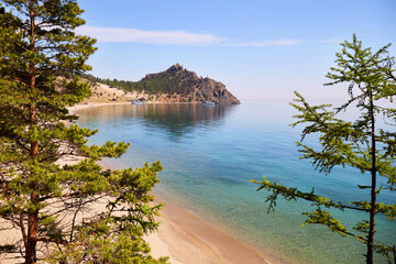 Obraz premium Beautiful view of Sandy Bay, Cape Kolokolny on a sunny summer day. A popular tourist spot on the shore of Lake Baikal.