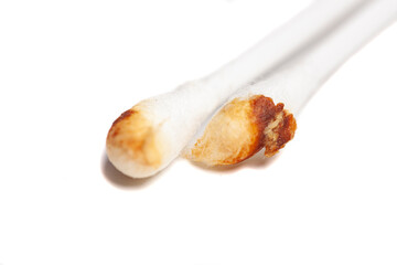 Ear wax on cotton swab isolated on white background