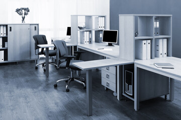 workplaces with computers in modern office - 511667769
