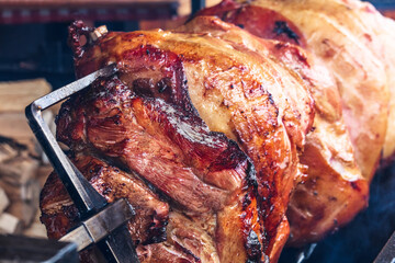 pork hams cooked on an open fire. The street food - 511667796