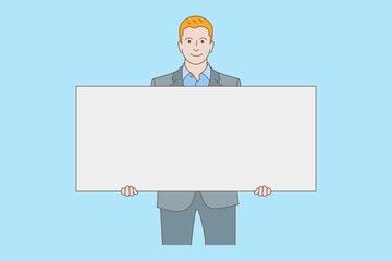 Smiling young businessman holding a blank copy space board