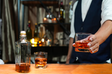 Bartender Serve Whiskey, on wood bar, 