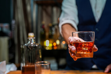 Bartender Serve Whiskey, on wood bar, 