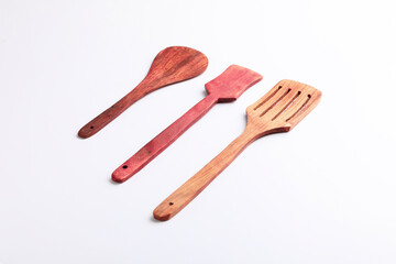 wooden spoon set on white background.