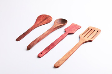 wooden spoon set on white background.
