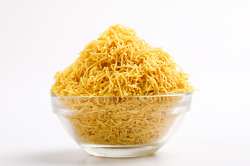 Sev. Besan Sev Indian Namkeen Noodles of chickpea flour. Besan Sev Popular Teatime Snack.
